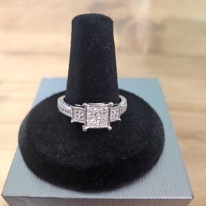 24. 925 Sterling Silver AAA CZ Ring.